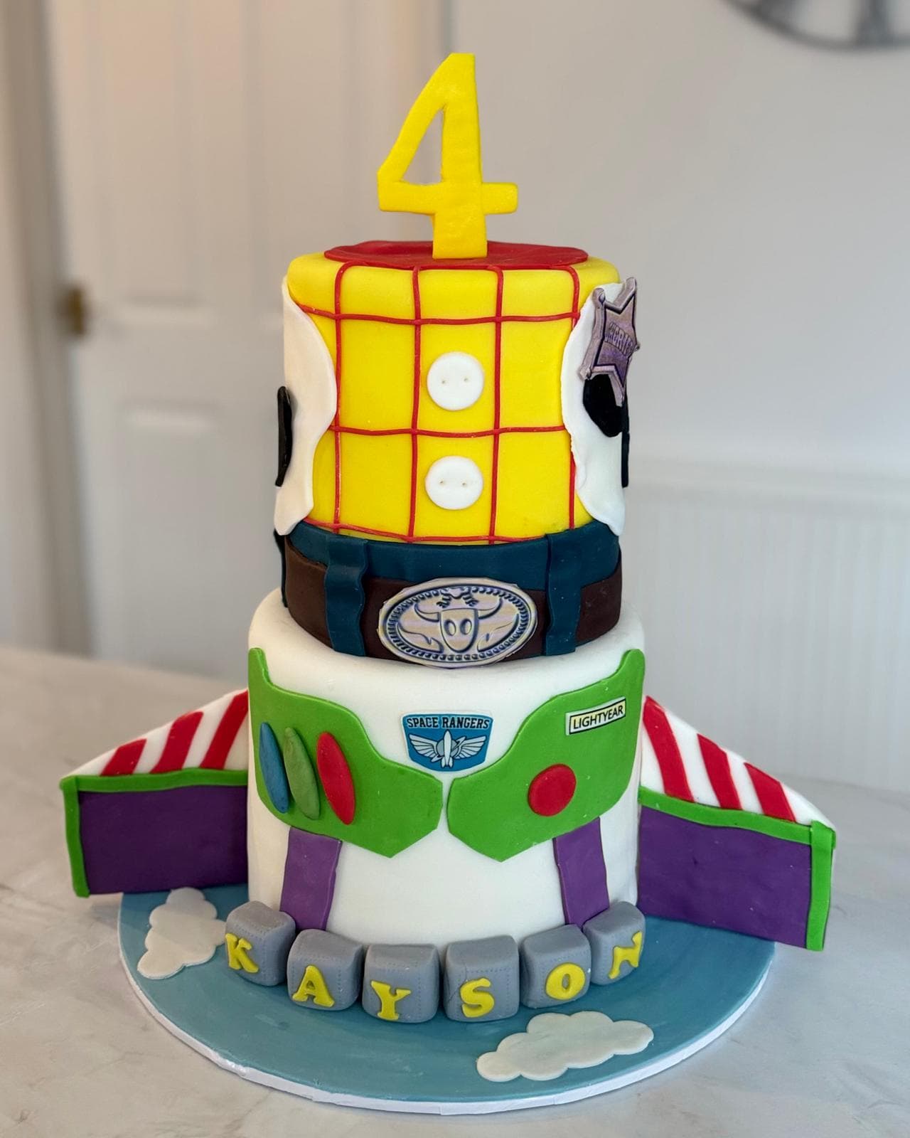 Toy Story themed tiered birthday cake